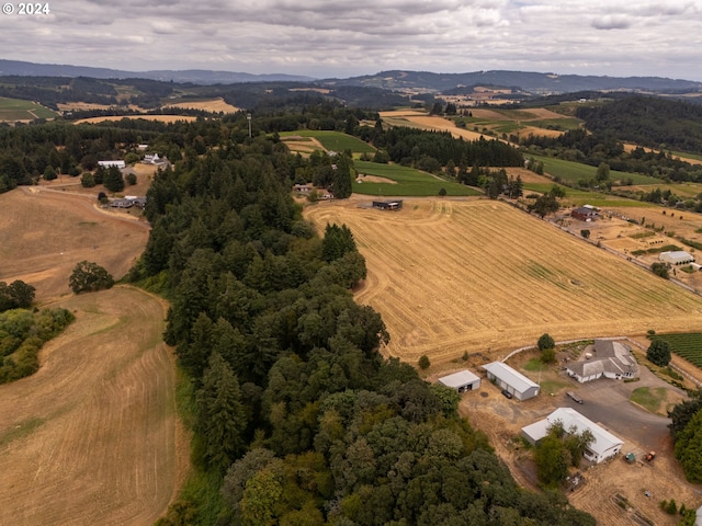 birds eye view of property featuring a rural view