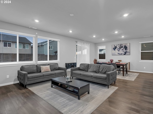 living room featuring dark hardwood / wood-style floors