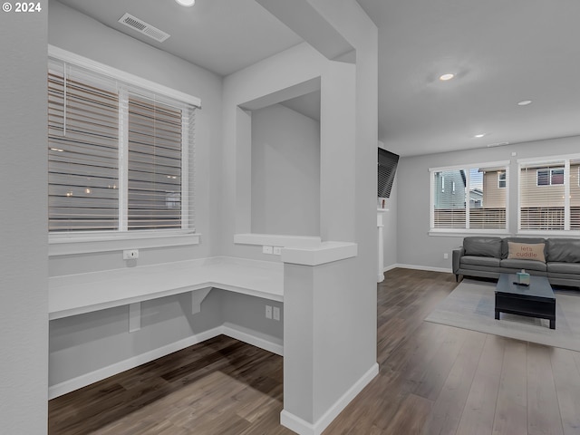 hall featuring dark wood-type flooring