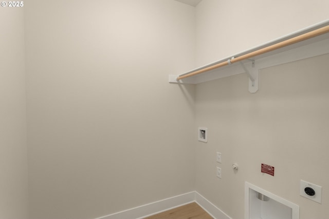 12040 SW Trask St Unit Lt96, Beaverton, OR 97007 - laundry area with electric dryer hookup, baseboards, hookup for a gas dryer, hookup for a washing machine, and light wood-type flooring