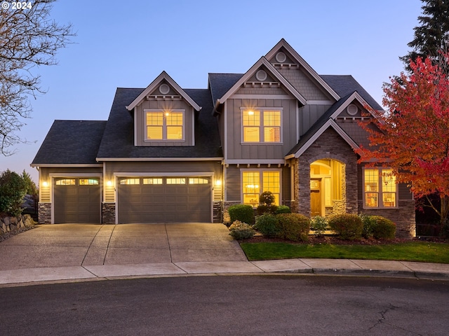 craftsman-style home with a garage