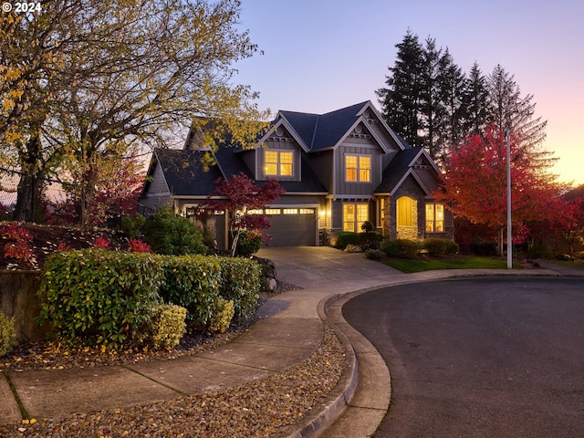 craftsman inspired home with a garage