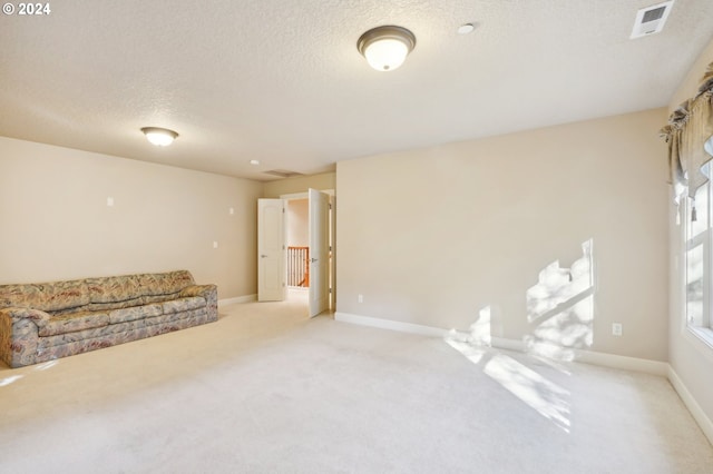 interior space featuring a textured ceiling