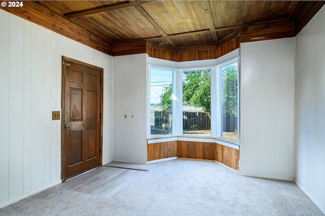 interior space featuring wooden ceiling