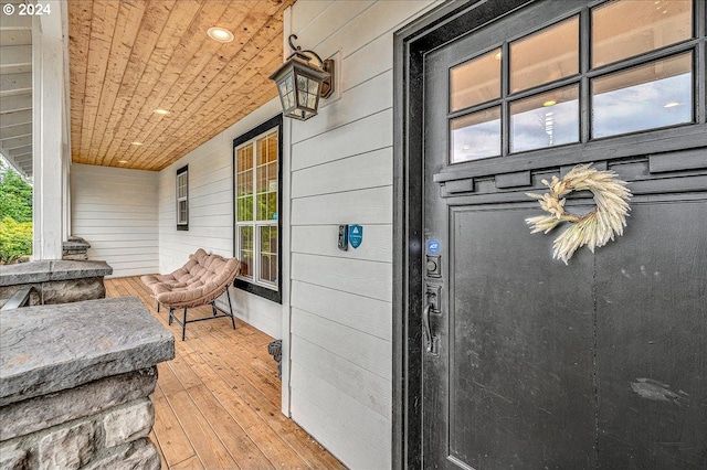 doorway to property featuring covered porch