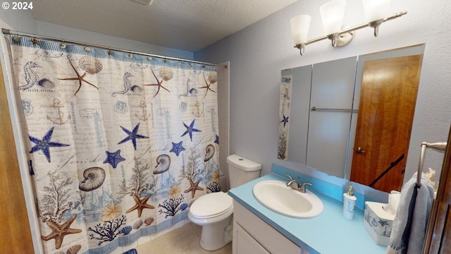 bathroom with tile patterned floors, a textured ceiling, toilet, vanity, and a shower with shower curtain