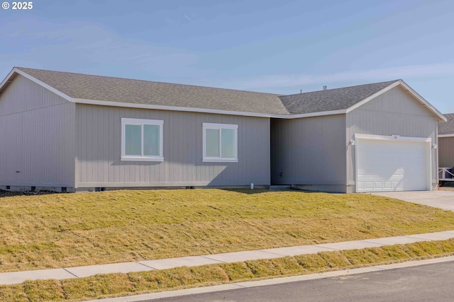 ranch-style home with a garage, crawl space, a shingled roof, and a front lawn