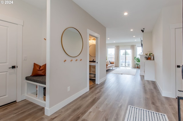 hall with light wood-type flooring