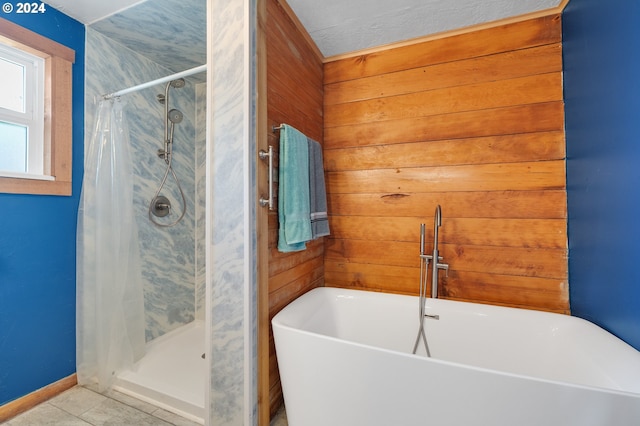 bathroom featuring wooden walls, tile patterned flooring, and a shower with shower curtain