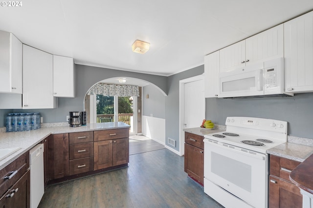 kitchen featuring white appliances, white cabinets, dark hardwood / wood-style floors, light stone countertops, and dark brown cabinetry