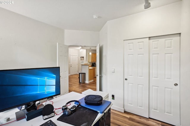 home office featuring hardwood / wood-style flooring