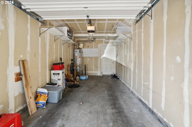 garage featuring gas water heater and a garage door opener