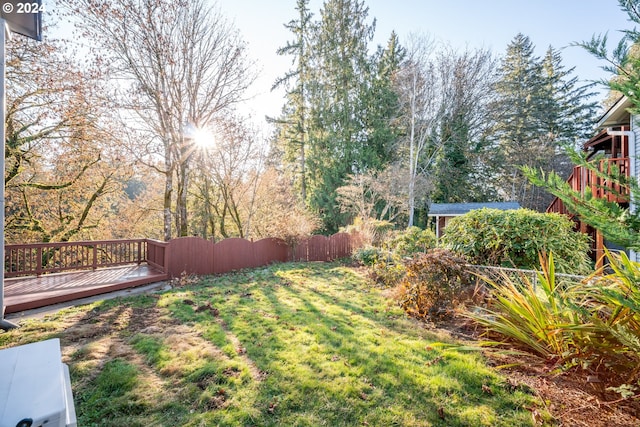 view of yard with a deck