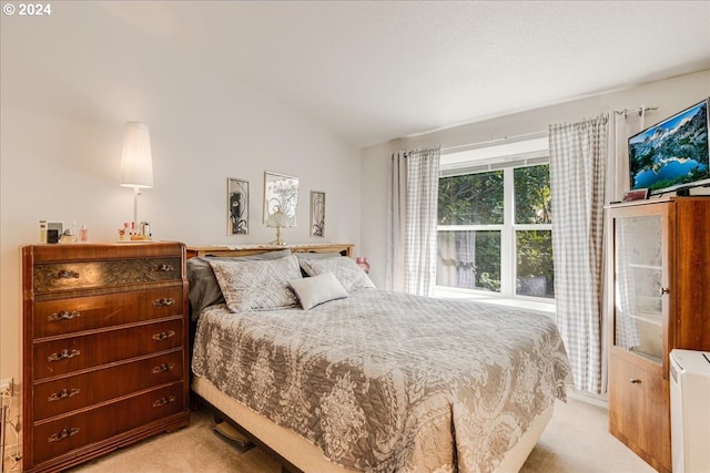 4744 W Powell Blvd Unit K227, Gresham, OR 97030 - bedroom featuring lofted ceiling and light colored carpet