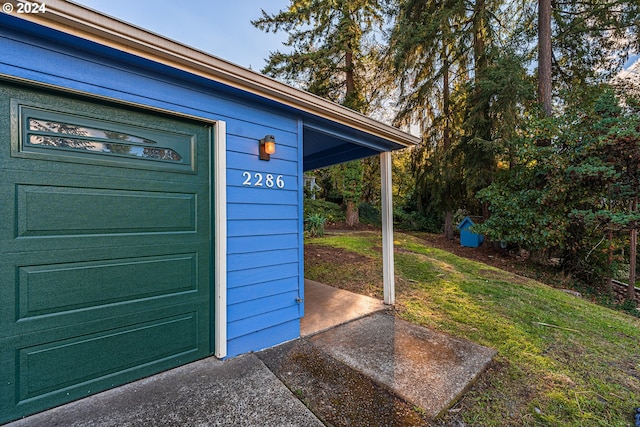 doorway to property with a yard