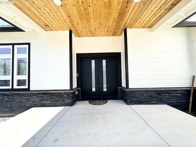 property entrance featuring french doors