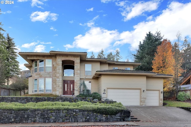 view of front of property with a garage