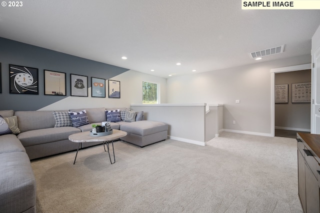 living room featuring light colored carpet