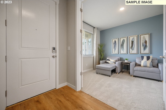 foyer with light wood-type flooring