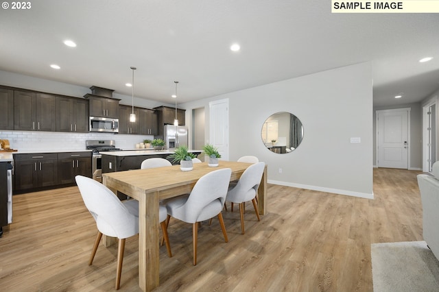 dining space featuring light hardwood / wood-style floors