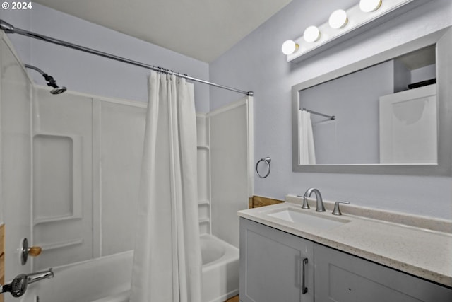 bathroom with vanity and shower / tub combo