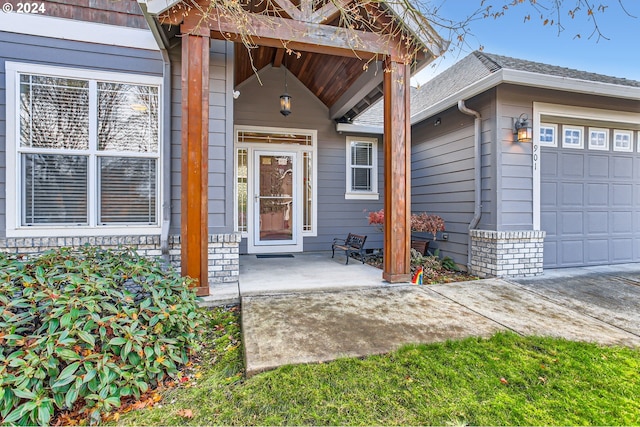 property entrance featuring a garage