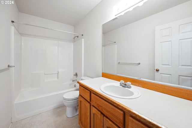 full bathroom featuring toilet, vanity, and tub / shower combination