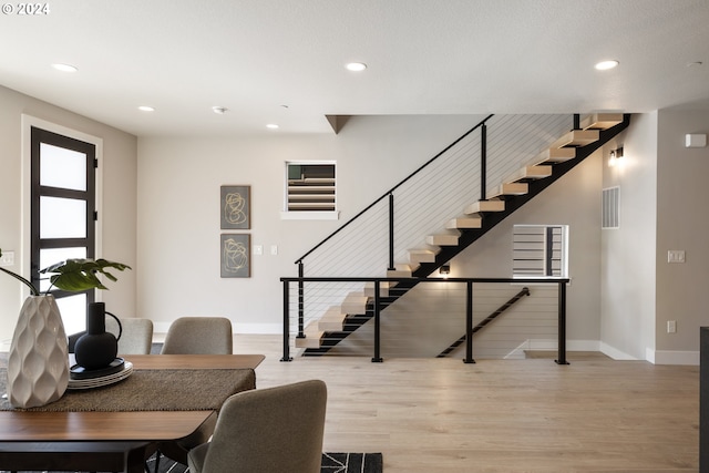 office space with light hardwood / wood-style floors