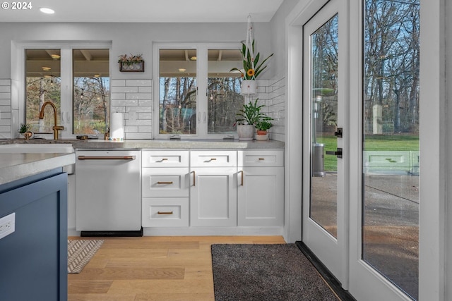 33020 S Dickey Prairie Rd, Molalla, OR 97038 - kitchen with dishwasher, white cabinets, light wood-style floors, healthy amount of natural light, and recessed lighting