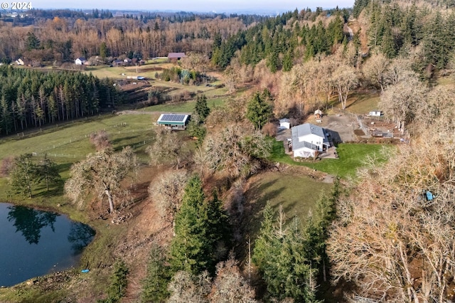 drone / aerial view featuring a rural view and a water view