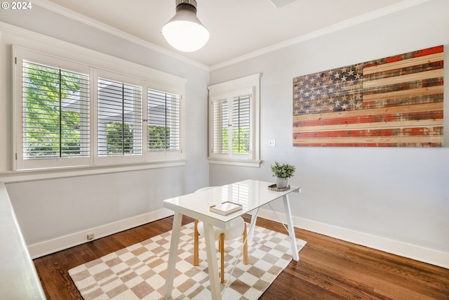 office area with baseboards, wood finished floors, and crown molding