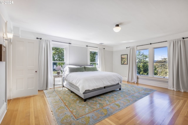 bedroom with light wood-style flooring