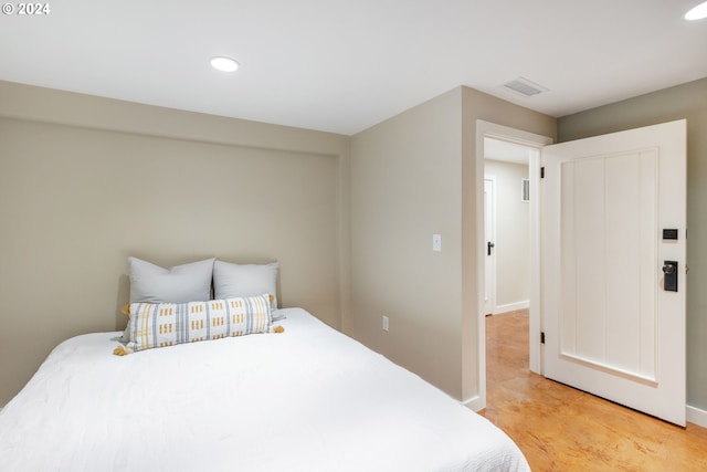 bedroom with recessed lighting, visible vents, and baseboards