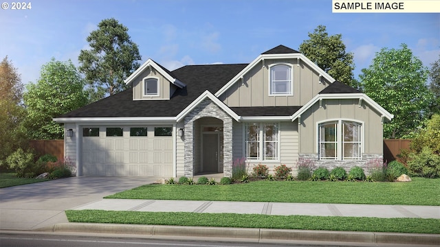 craftsman-style home with a front yard and a garage