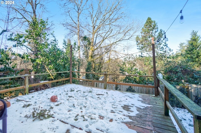 view of snow covered deck