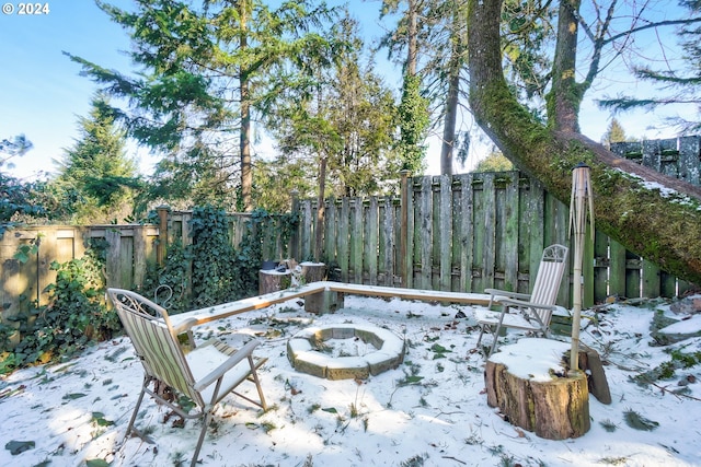 view of snow covered patio