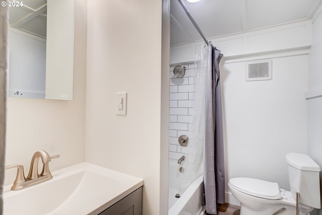 full bathroom featuring toilet, vanity, and shower / tub combo