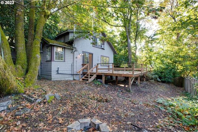 rear view of house with a deck