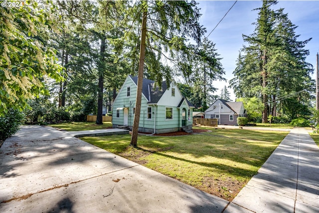 view of property exterior with a yard