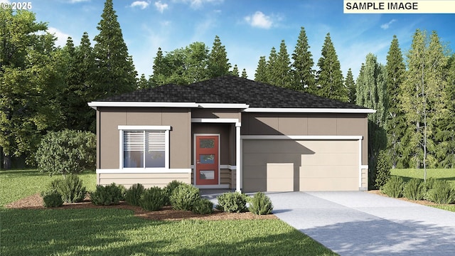 view of front of property featuring a garage and a front yard