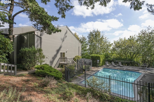 view of pool featuring a patio area