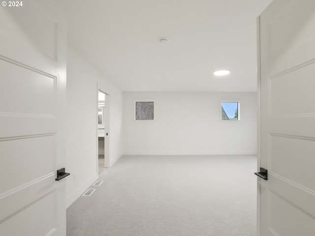 interior space with light colored carpet