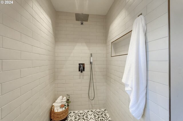 bathroom with tiled shower