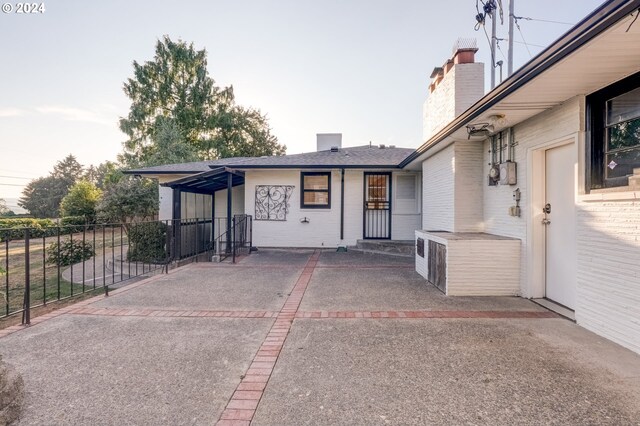 view of front facade featuring a patio area