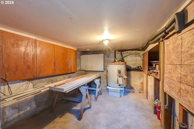 basement featuring electric water heater