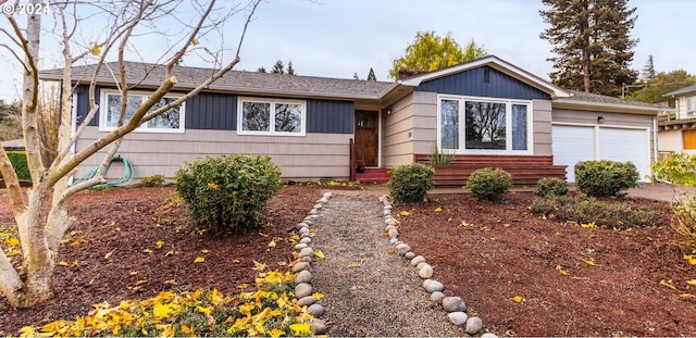 ranch-style home with a garage