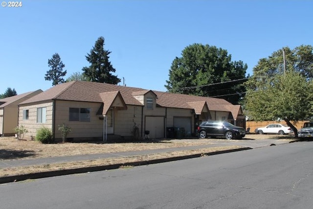 single story home with a garage