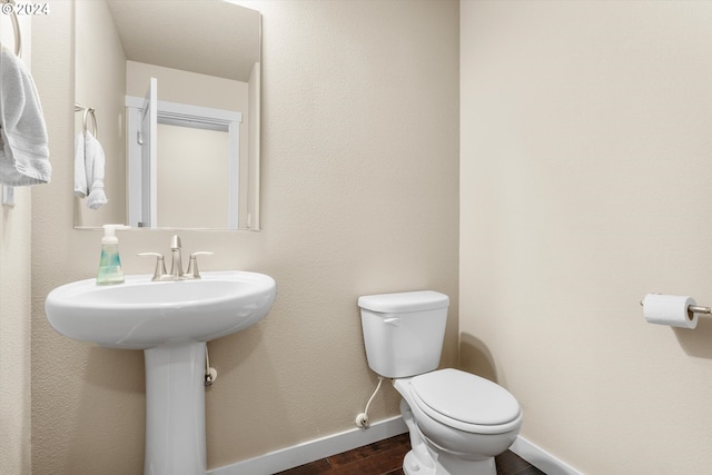 bathroom featuring toilet