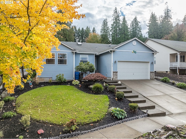 ranch-style home with a front lawn and a garage