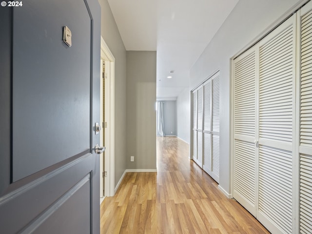 hallway featuring light wood-type flooring